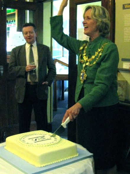 WHS 60th Mayor cuts cake
